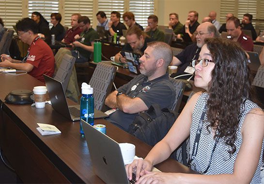 TechEX participants at a session.